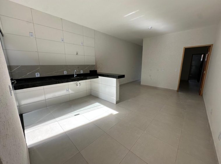 Cozinha e sala na Casa no Parque Eldorado Oeste