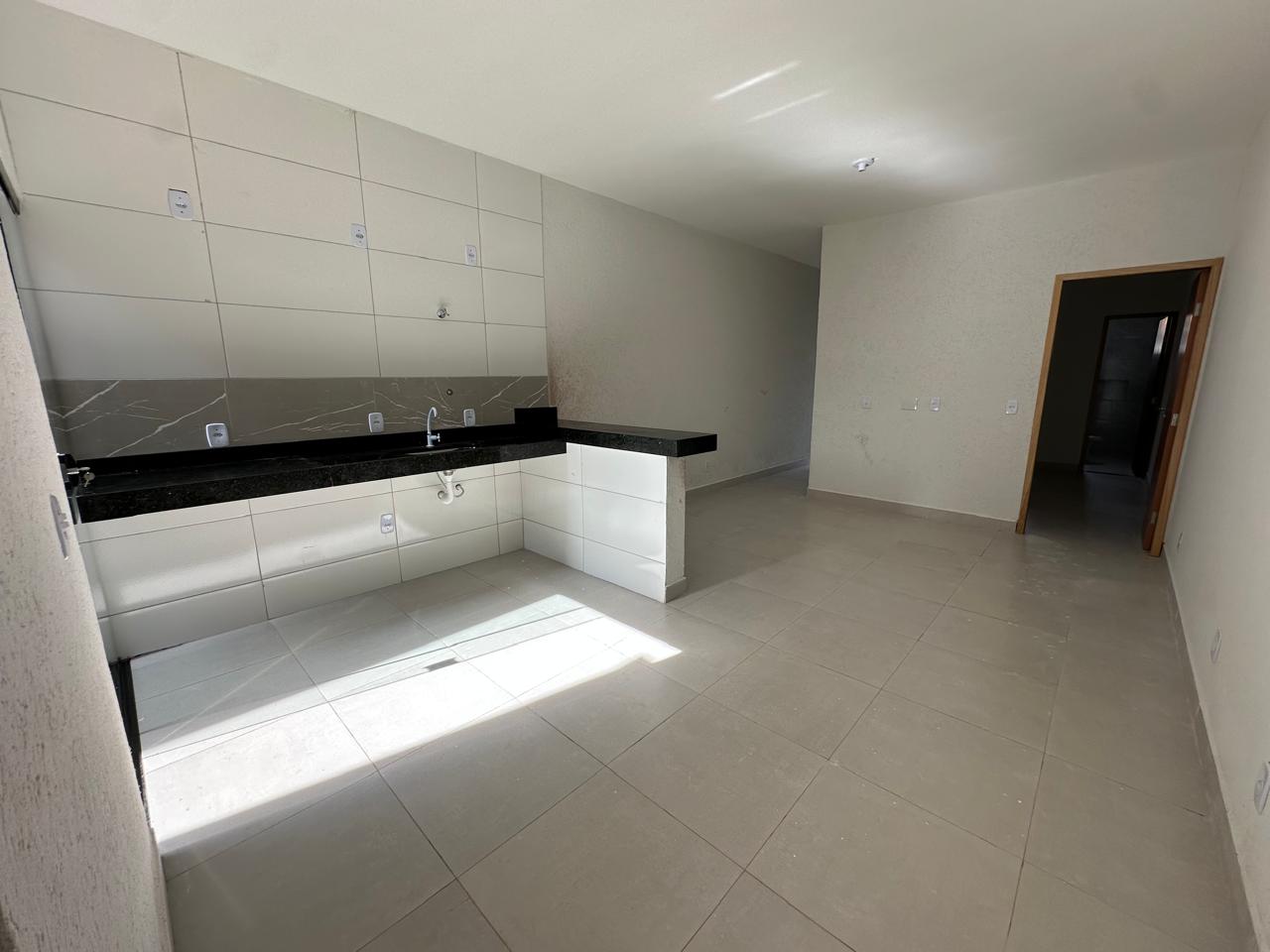 Cozinha e sala na Casa no Parque Eldorado Oeste