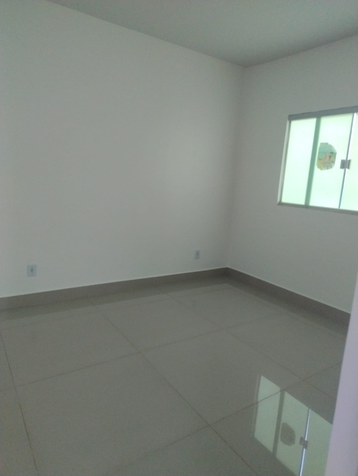 Sala (foto 1) da Casa no Jardim Helvencia